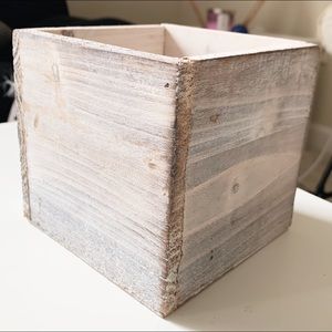 Distressed white wooden box planter box